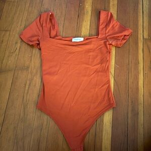 Aritzia Babaton burnt orange bodysuit